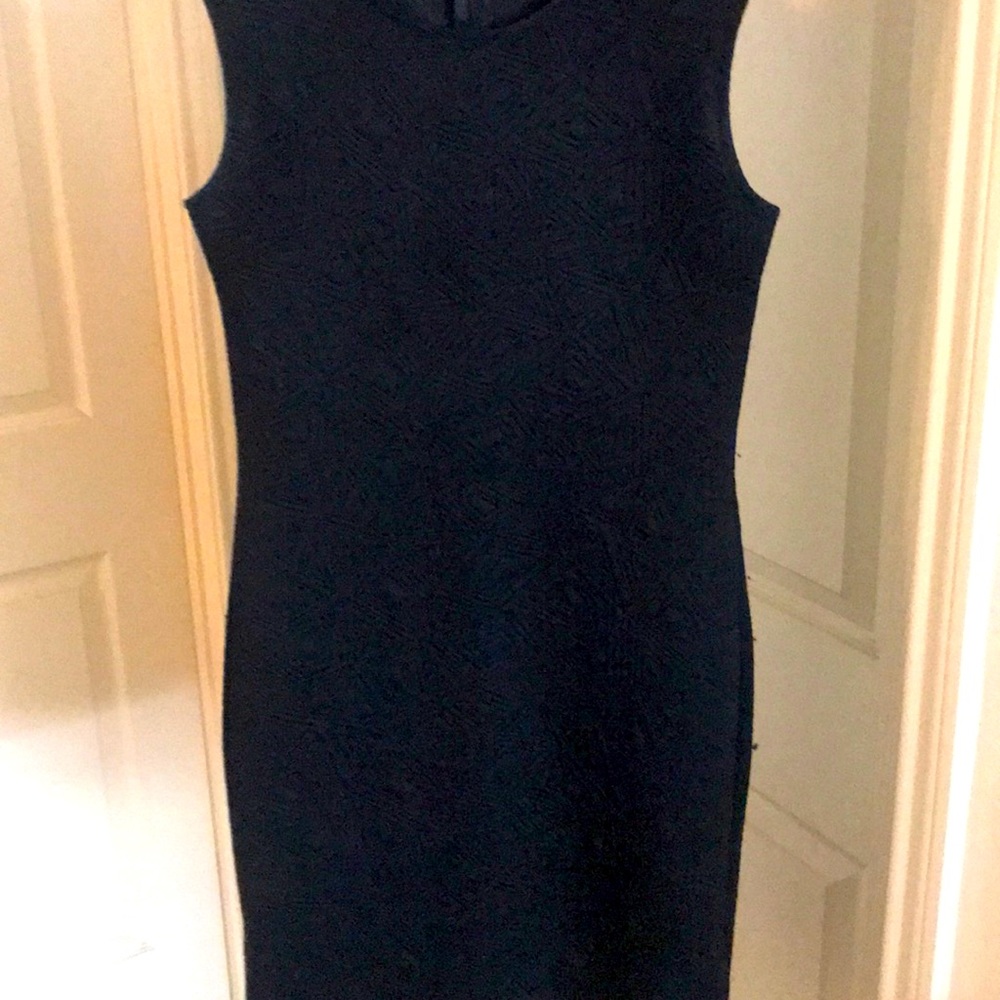 A Black Sleeveless Dress